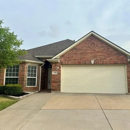 Rent this 3 bed house on 974 Woodrow Dr in Lewisville, Texas