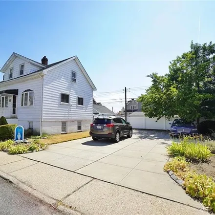 Buy this 3 bed house on 61 Aster Court in New York, NY 11229
