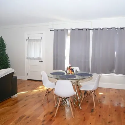 Rent this 5 bed apartment on 257 Paris Street in Boston, MA 02128