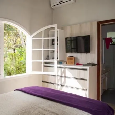 Rent this 4 bed house on Rua Recanto das Cachoeiras in Ponta das Canas, Florianópolis - SC