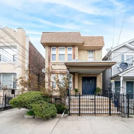 Buy this 8 bed house on 178 Armstrong Avenue in Greenville, Jersey City