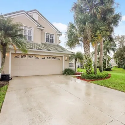 Buy this 3 bed house on 1684 Southwest Harbor Isles Circle in Port Saint Lucie, FL 34986