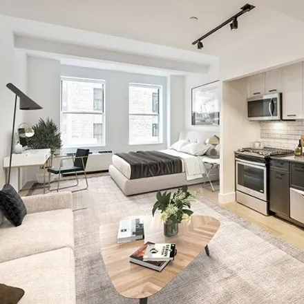 Rent this studio apartment on 67 Wall St Apt 4F in New York, 10005