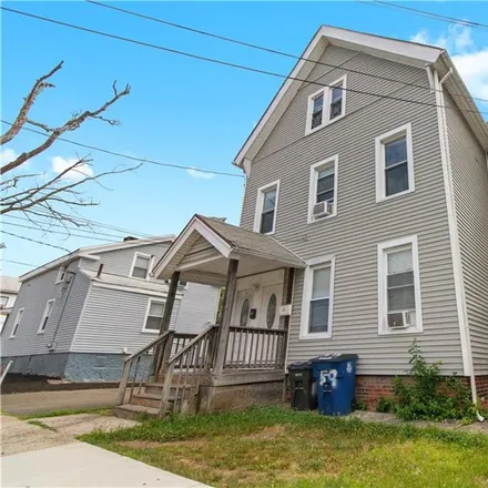 Buy this 8 bed townhouse on Peck Alley in New Haven, CT 06513