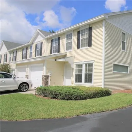 Rent this 2 bed townhouse on 13021 Thoroughbread Loop in Largo, FL 33773