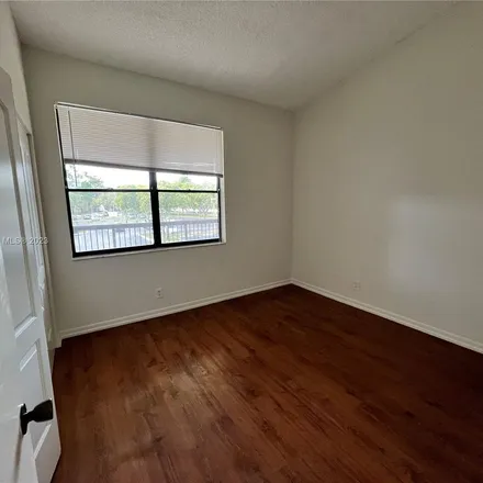 Rent this 2 bed apartment on 7386 Northwest 1st Street in Plantation, FL 33317