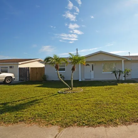 Buy this 2 bed house on 1432 Merrilon Drive in Holiday, FL 34691