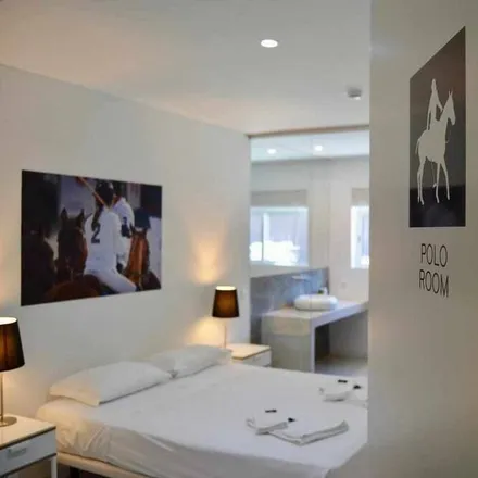 Rent this 9 bed house on Novo Banco - Quarteira in Rua Vasco da Gama 75, 8125-182 Quarteira