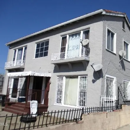 Buy this 14 bed house on 265 West 41st Place in Los Angeles, CA 90037