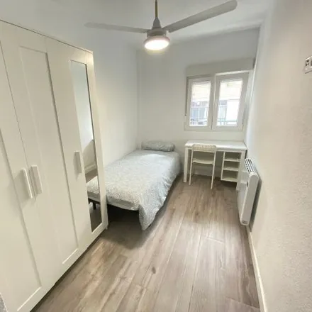 Rent this 3 bed room on Calle de Encarnación Oviol in 28021 Madrid, Spain