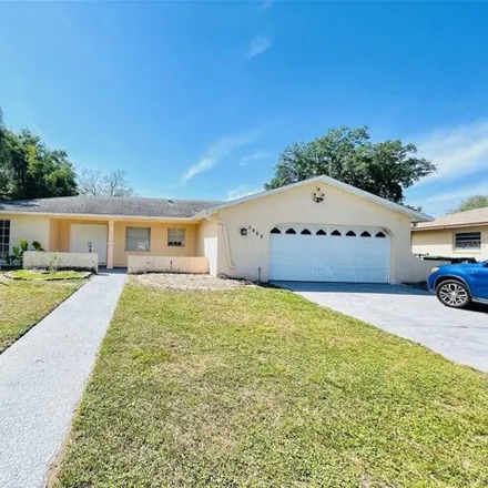 Rent this 4 bed house on 5976 Valerian Boulevard in Doctor Phillips, FL 32819
