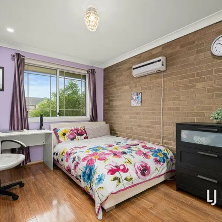 Rent this 3 bed duplex on Wellwood Avenue in Moorebank NSW 2170, Australia