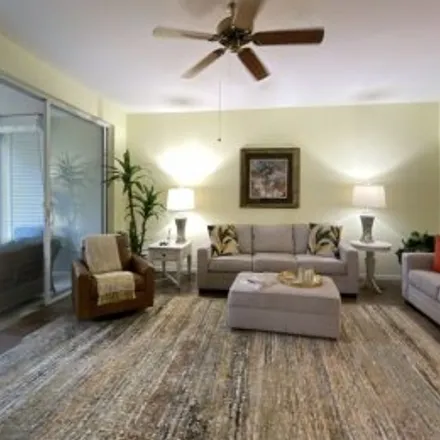 Rent this 2 bed apartment on #102,3775 Fieldstone Boulevard in Fieldstone Village Condominiums, Naples