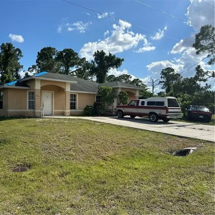 Buy this 6 bed house on 838 Grant Boulevard in Lehigh Acres, FL 33974