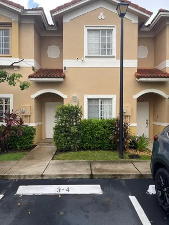 Rent this 2 bed townhouse on 2967 Riverside Avenue in Tamarac, FL 33321