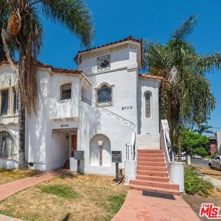 Buy this 8 bed house on 8701 W Olympic Blvd in Los Angeles, California