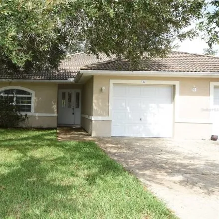Rent this 3 bed house on 23 Rosepetal Lane in Palm Coast, FL 32164