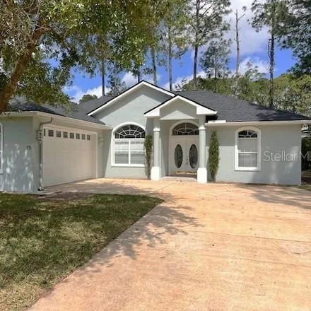 Rent this 3 bed house on 13 Burning Sands Lane in Palm Coast, FL 32137