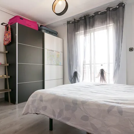 Rent this 4 bed room on Carrer de Soledad Doménech in 12, 46020 Valencia