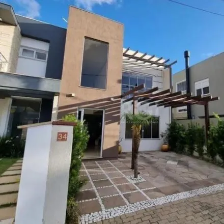 Buy this 3 bed house on Rua Carlos Maximiliano Fayet in Hípica, Porto Alegre - RS