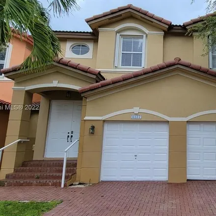 Buy this 4 bed house on 8377 Northwest 113th Place in Medley, Doral