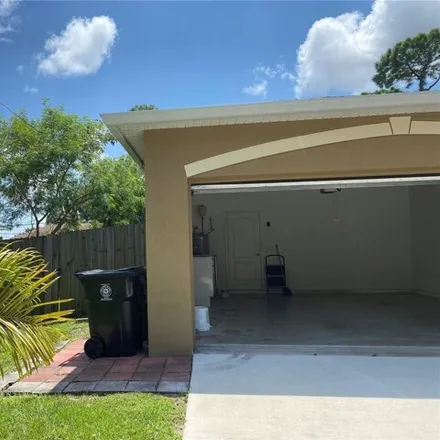 Buy this 4 bed house on 1174 Sw Goodman Ave in Port Saint Lucie, Florida