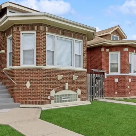 Buy this 6 bed house on 7538 South Winchester Avenue in Chicago, IL 60620