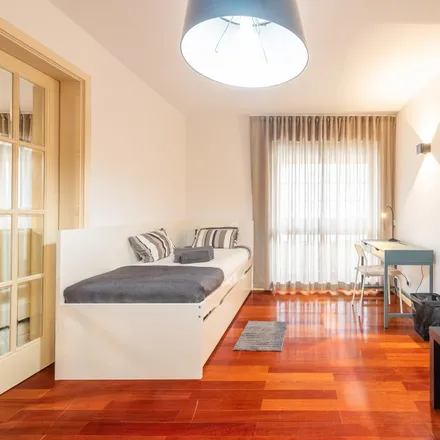Rent this 4 bed room on SysValue in Praça Nuno Rodrigues dos Santos, 1600-134 Lisbon
