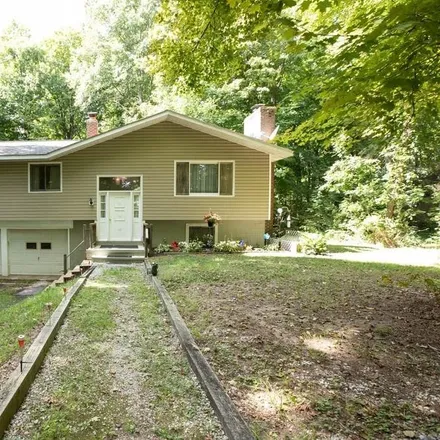 Buy this 3 bed house on 13460 Hotchkiss Road in Burton, Burton Township