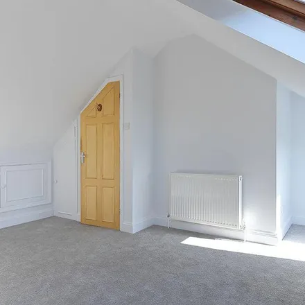 Rent this 4 bed townhouse on 47 Toynbee Road in London, SW20 8SH