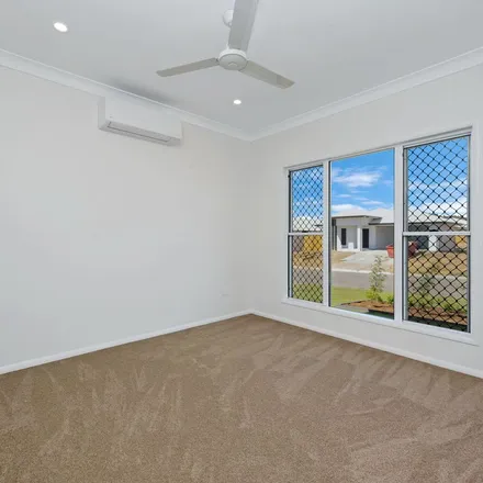Rent this 3 bed apartment on 43 The Rocks Boulevard in Cosgrove QLD 4818, Australia