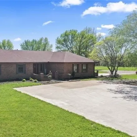Buy this 4 bed house on 18101 MO 58 in Raymore, MO 64083