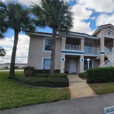 Rent this 2 bed condo on 13830 Timberland Drive in Meadow Woods, FL 32824