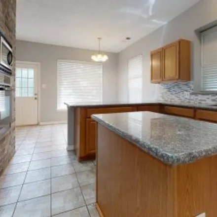 Rent this 4 bed apartment on 14202 Towerglen Court in Charlestown Colony, Houston