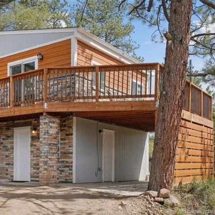Buy this 2 bed house on 5093 South Road A in Evergreen, CO 80439