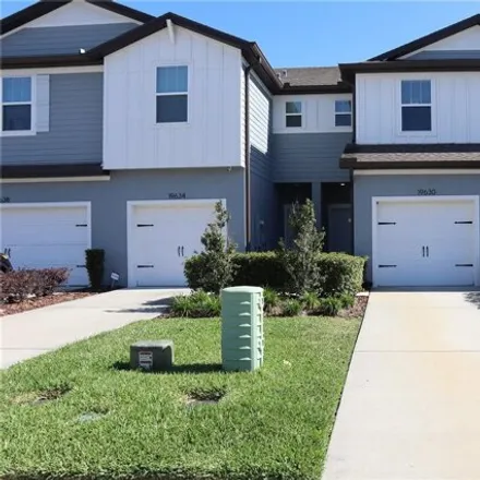 Rent this 2 bed townhouse on Shady Oak Drive in Pasco County, FL 34638