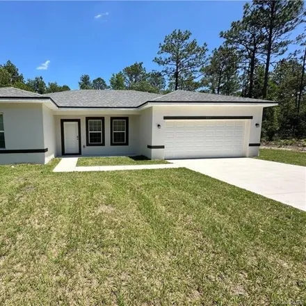 Rent this 4 bed house on North Oxford Terrace in Citrus Springs, FL 34433