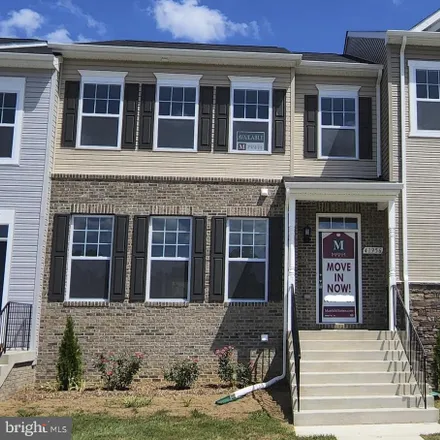 Buy this 3 bed townhouse on 22098 Briarwood Court in Spring Valley, Lexington Park