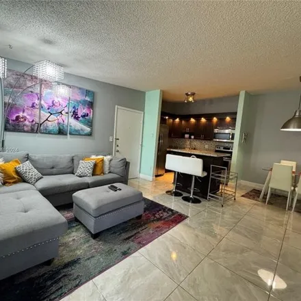 Rent this 2 bed condo on Northwest 68th Place in Tamarac, FL 33321