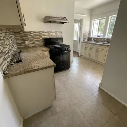 Rent this 3 bed apartment on 5265 Fountain Avenue in Los Angeles, CA 90029