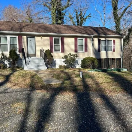 Buy this 4 bed house on 7644 Old Bayside Road in Chesapeake Beach, MD 20732