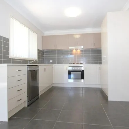 Rent this 4 bed apartment on Kerry Street in Marsden QLD 4132, Australia