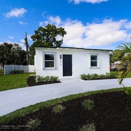 Buy this 2 bed house on 1514 Northwest 3rd Way in Kendall Green, Pompano Beach
