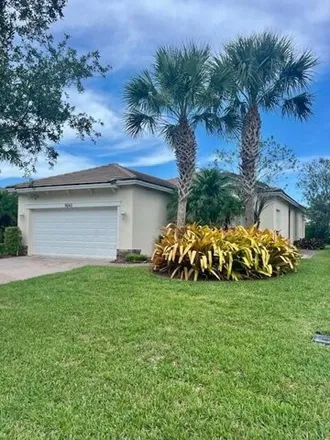 Rent this 3 bed house on 9642 SW Lindale Trace Blvd in Port Saint Lucie, Florida
