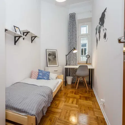 Rent this 6 bed room on Plac Na Rozdrożu in 00-584 Warsaw, Poland