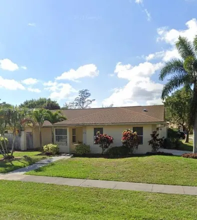 Rent this 4 bed house on 13736 Barberry Drive in Wellington, Palm Beach County