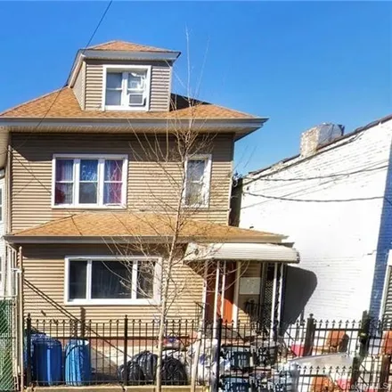 Buy this 6 bed townhouse on 1790 Randall Avenue in New York, NY 10473
