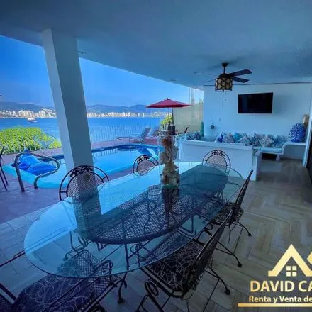 Rent this 4 bed house on Gran Vía Tropical in Fracc. Vista del Mar, 39300 Acapulco