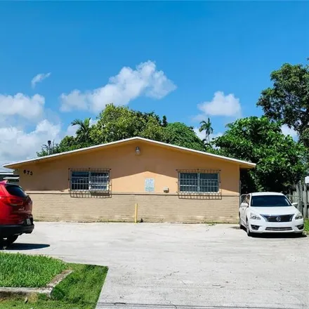 Rent this 2 bed apartment on 673 Northeast 86th Street in Miami, FL 33138