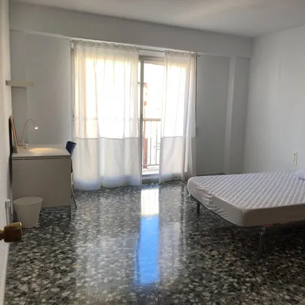 Rent this 6 bed room on Carrer de l'Actor Mora in 46009 Valencia, Spain